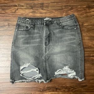 Black distressed denim skirt